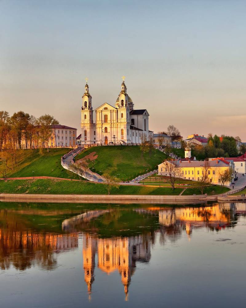 A domed cathedral above the river in Vitebsk, Belarus