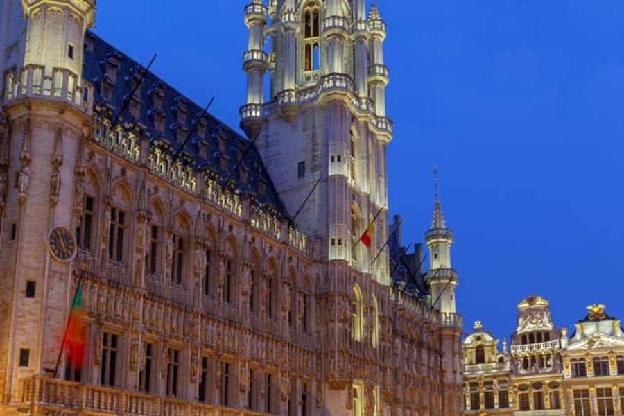 The Gothic Town Hall spire on the Grand-Place at dusk, Brussels, Belgium
