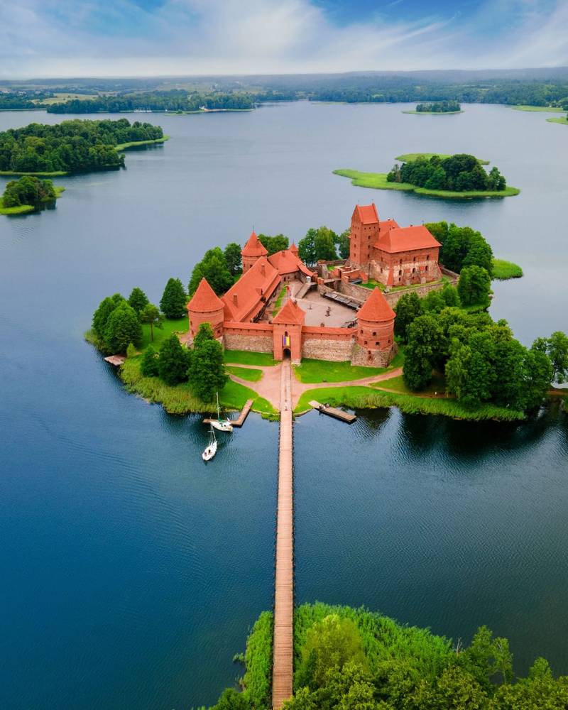 The red-brick Trakai Island Castle on its lake, Lithuania