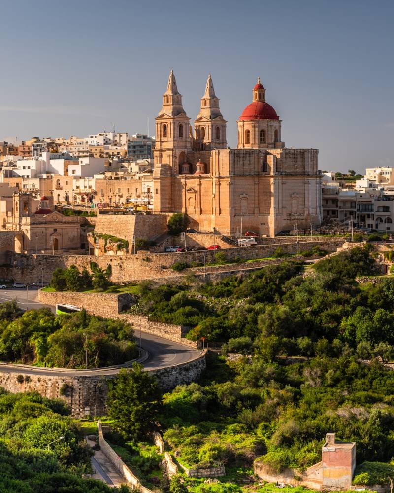 A hilltop parish church overlooking the town of Mellieha, Malta