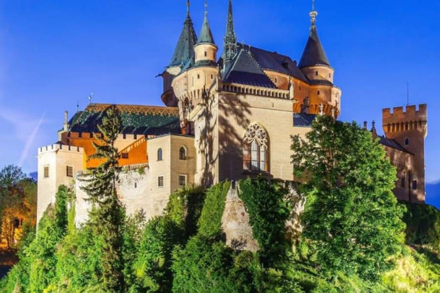 The fairytale towers of Bojnice Castle at dusk, Slovakia