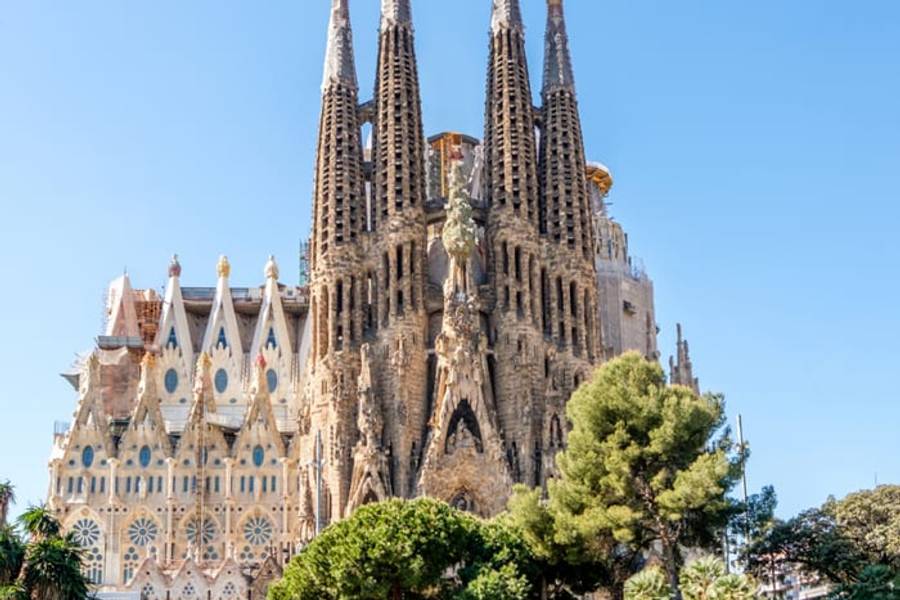 The towers of the Sagrada Familia against a clear blue sky, Barcelona, Spain